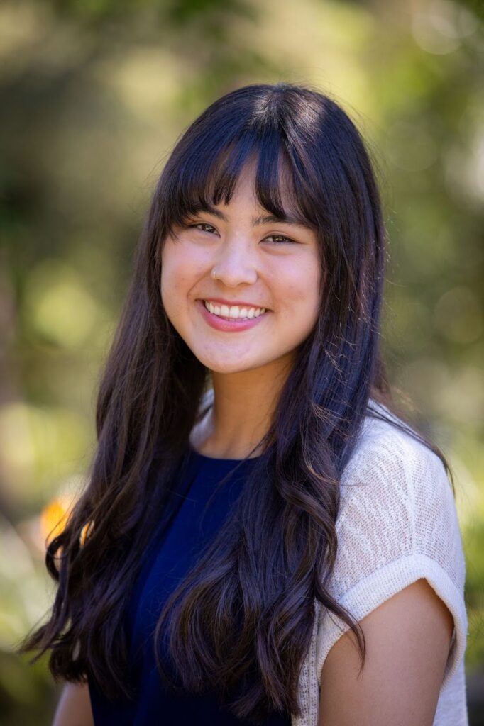 A headshot of Bailey Hall.